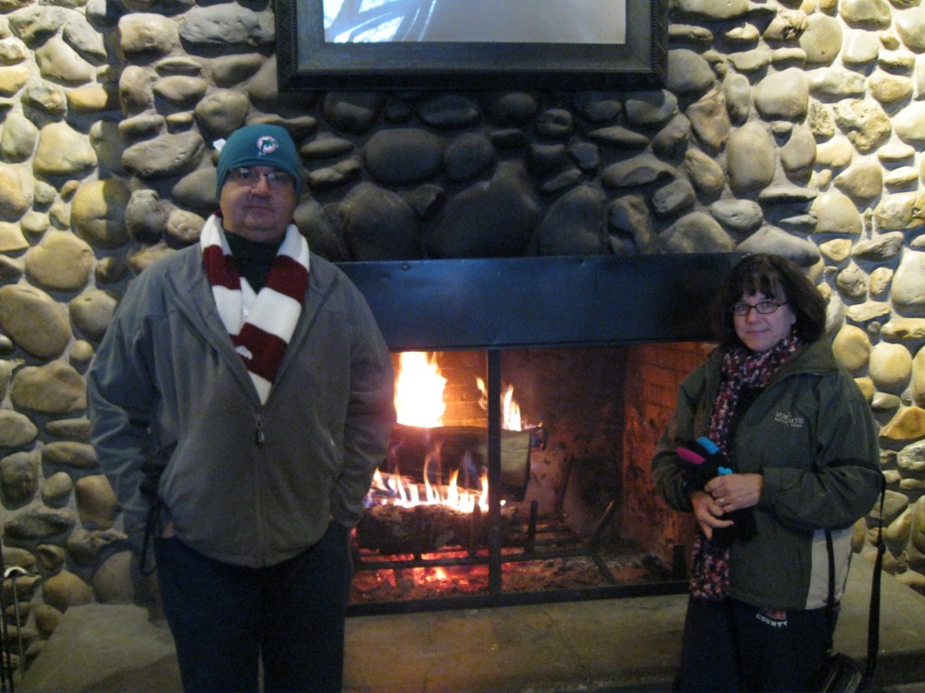 Warming up by the fire.