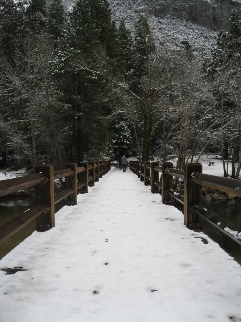 Walking across Swinging Bridge.