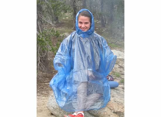Julia's answer to the biting mosquitos, don the rain poncho.
