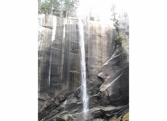At its capacity, Vernal Fall sprays the trail like rain from a torrential downpour.
